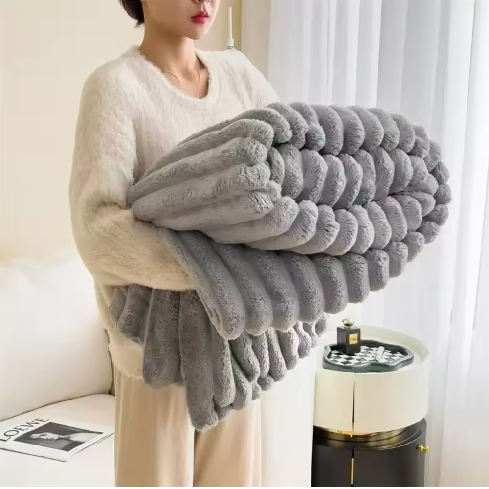 Plaid polaire de canapé